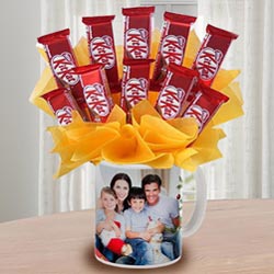 Exclusive Kitkat Chocolates Arrangement in Personalized Coffee Mug