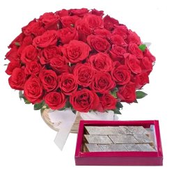 Kaju Barfi N Red Roses Basket Arrangement